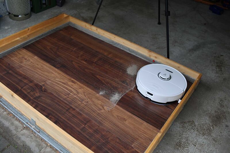 Vacuuming sand on hard floor